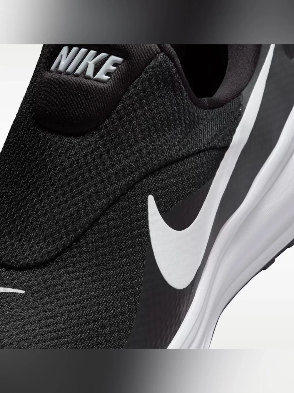 Nike Men’s Black and White Slip-On Running Shoes